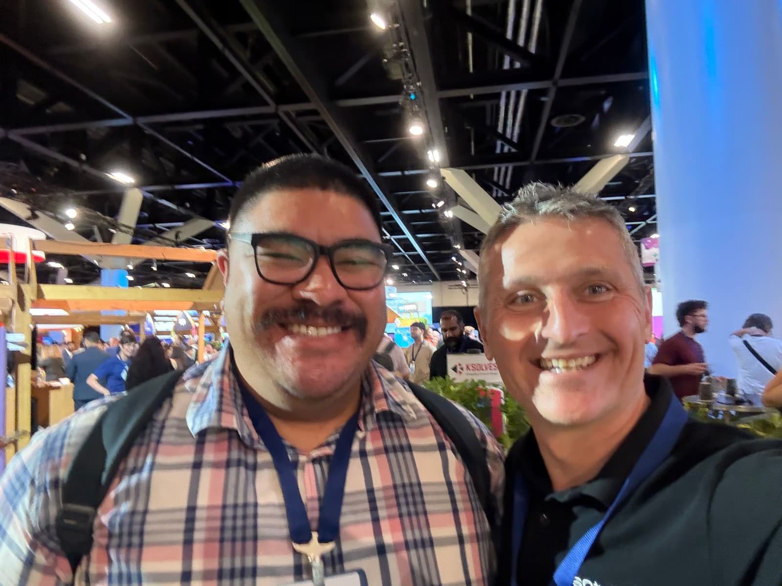 Sharing a laugh with a friend at a conference